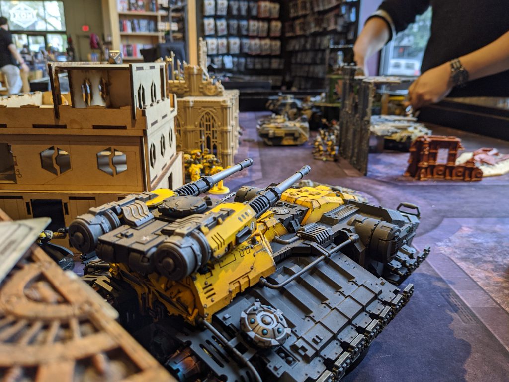 An Imperial Fists Astraeus lines up shots on renegade Leman Russes