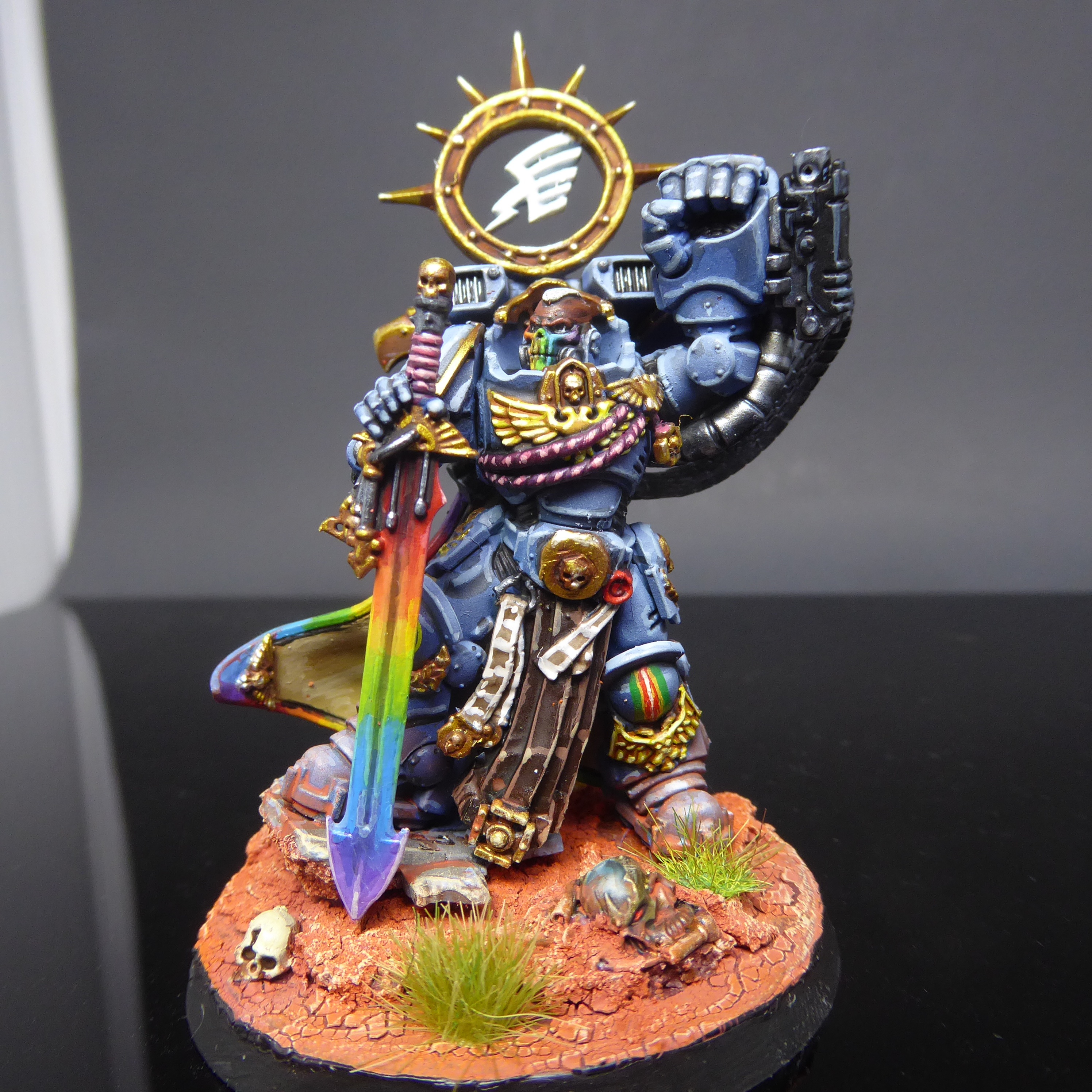 Chapter Master Arcus Pluvius of the Rainbow Warriors holding the relic sword Hue Resplendent