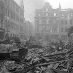 Soviet-tanksd-advance-through-shattered-berlin-streets