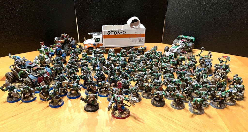 A whole lot of ork models, painted poorly