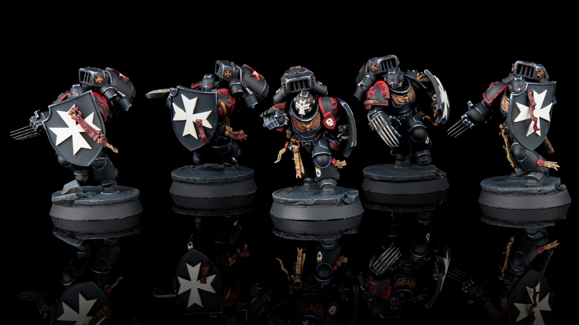 Black Templar Vanguard Veterans with storm shields and lightning claws