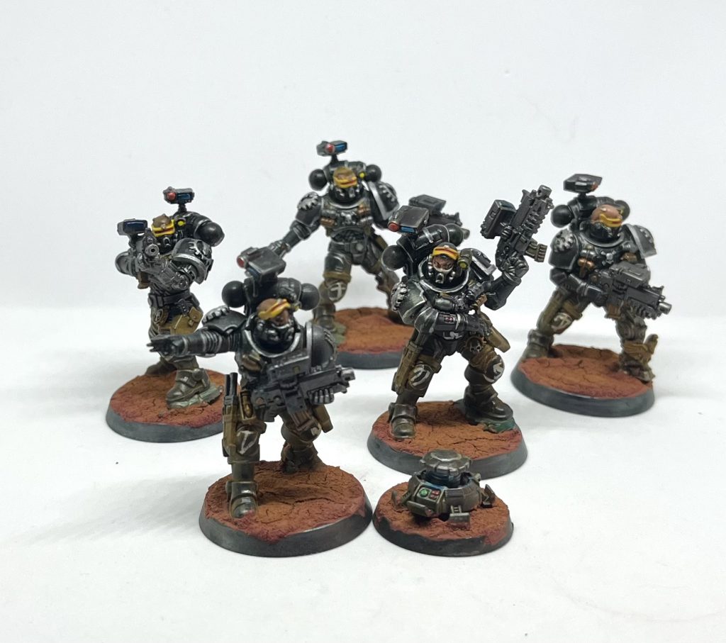 A unit of 5 Iron Hands Incursors standing around, doing nothing