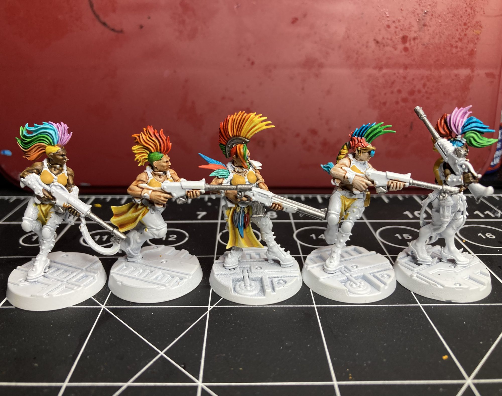 Five Escher gangers with rainbow hair styles