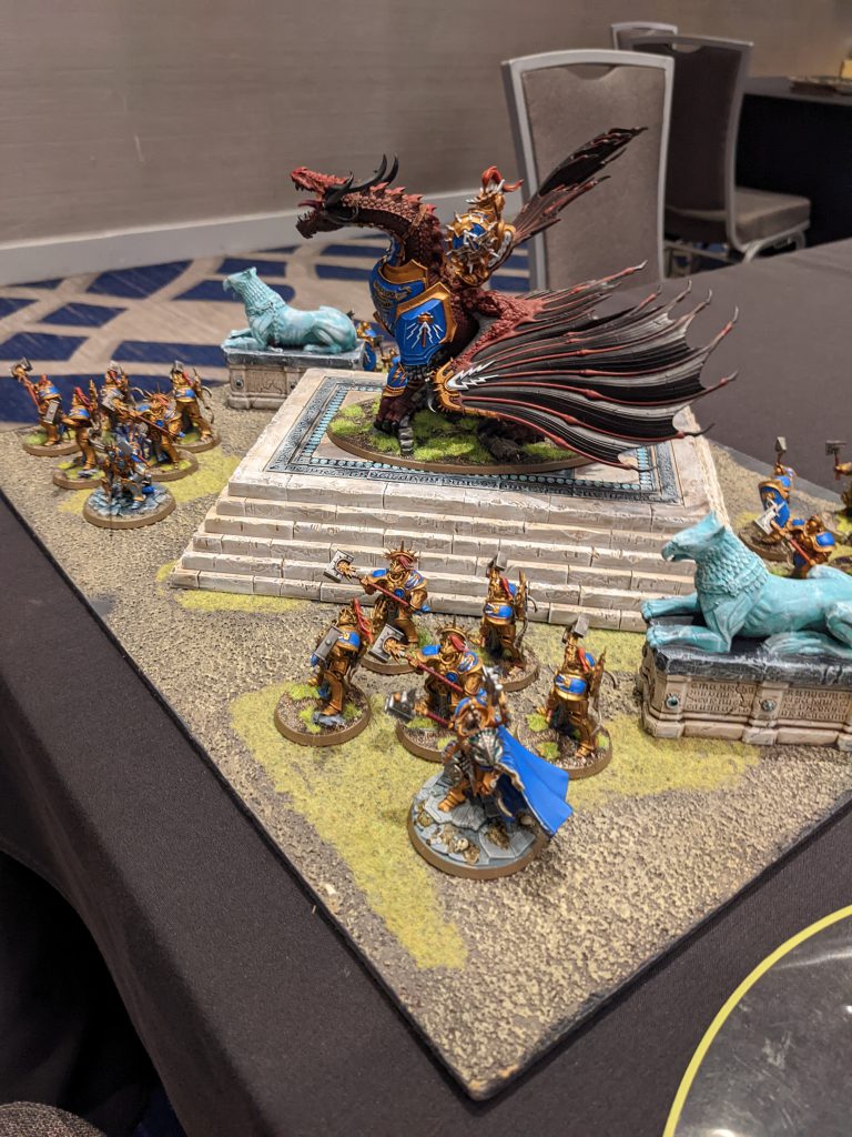An extremely well painted stormcast eternals army on display board
