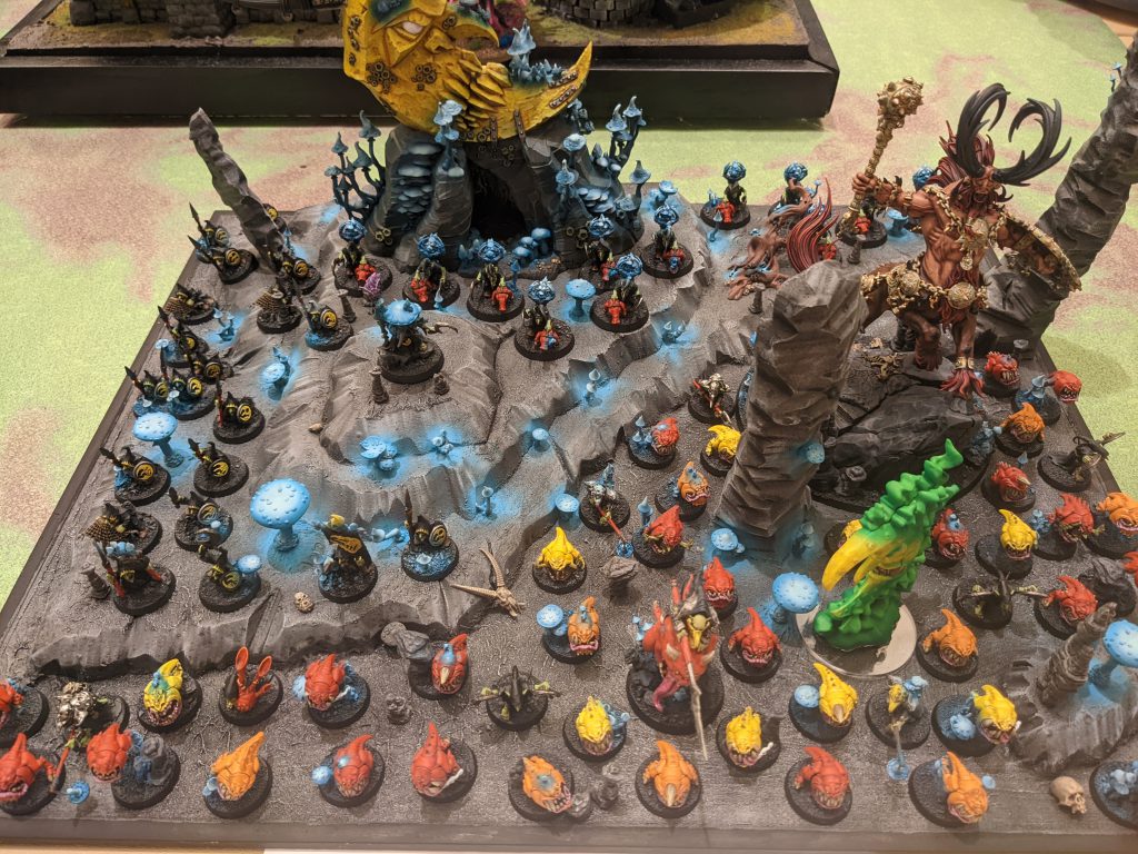 Gitz and Kragnos on a mushroom display board