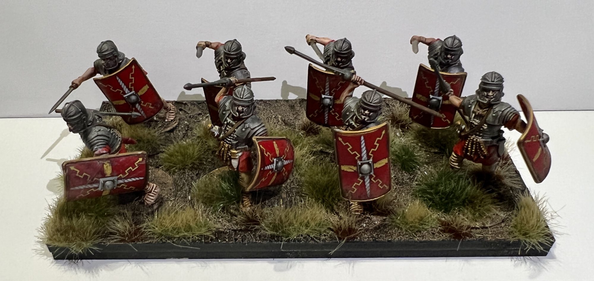 Eight Roman Legionnaires fully painted and based. 