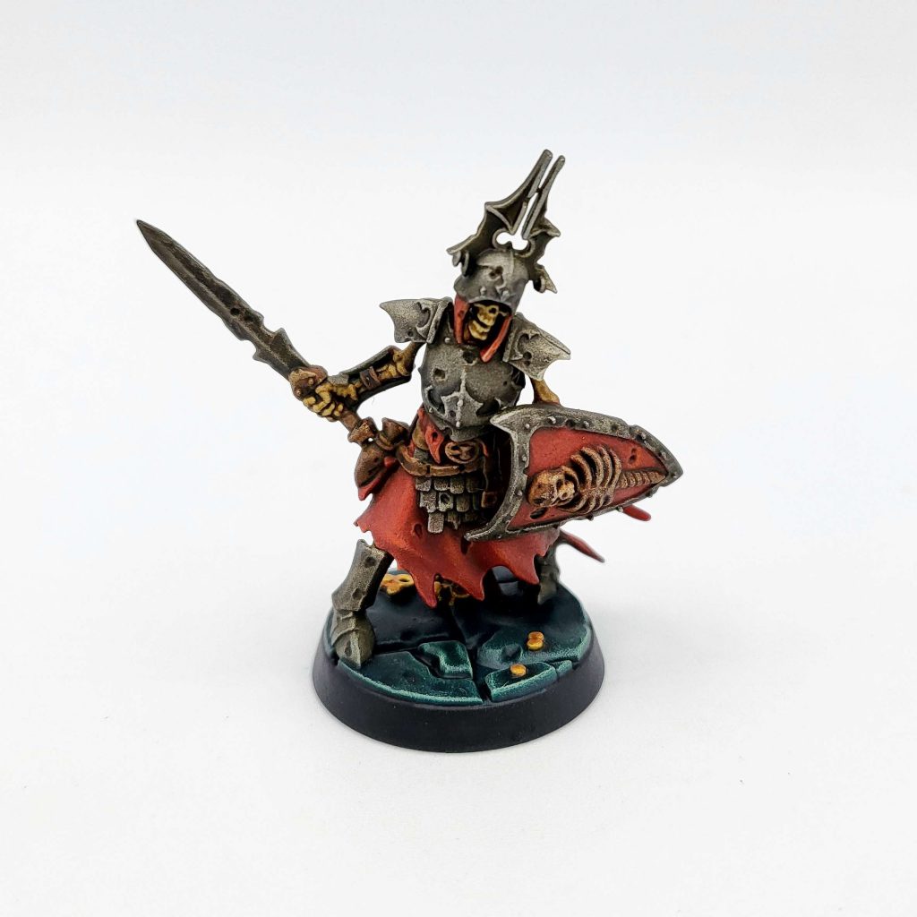 Wash of Agrax Earthshade to the base, and a was of 1:2 Abbadon