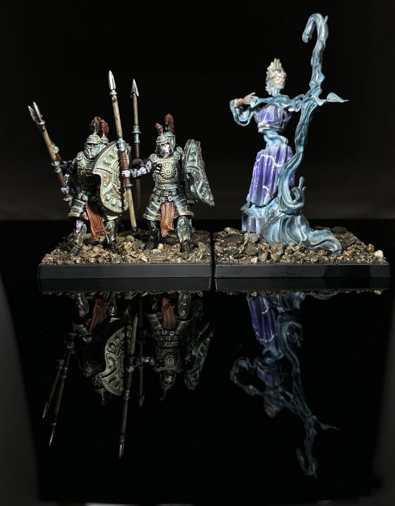 Priestess statue armed with bow, and four undead legionnaires