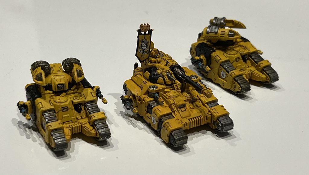 A Legion Kratos Commander leads a Sicaran Arcus Squadron