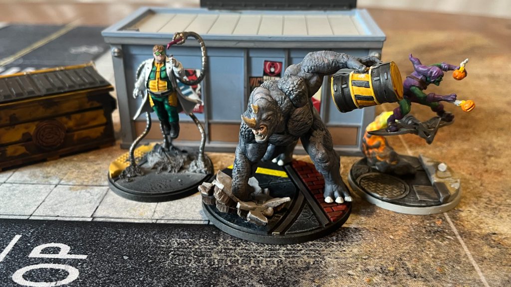 Rhino, Doc Ock, and Green Goblin on the street in Marvel Crisis Protocol