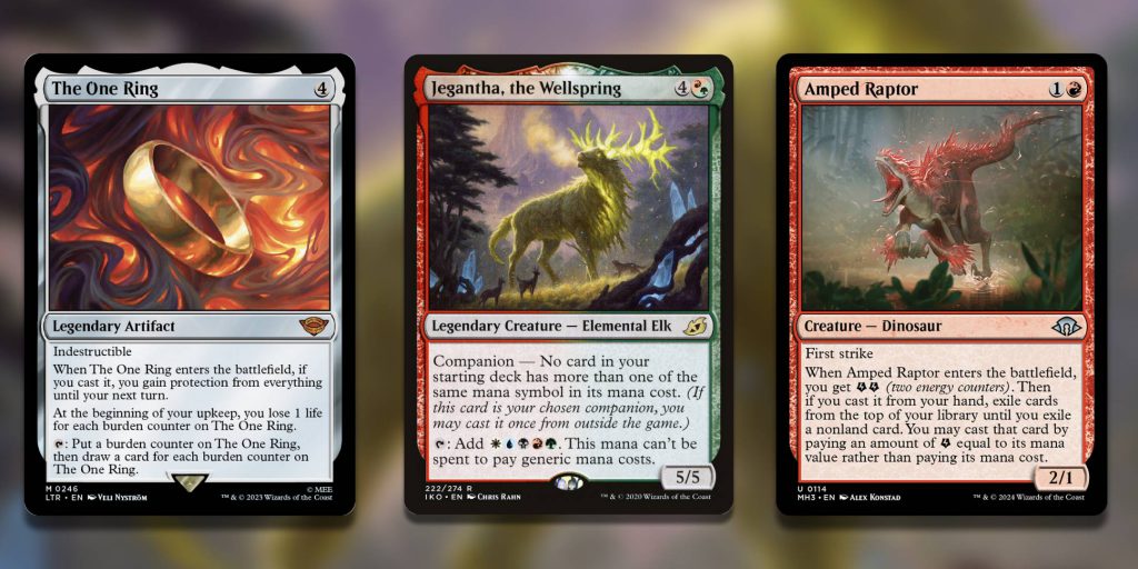 Three banned Modern Magic The Gathering cards, The One Ring, Jegantha, and Amped Raptor.