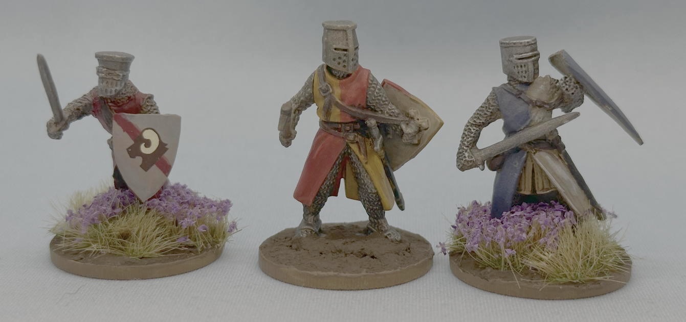 A Wargames Atlantic foot knight flanked by two Footsore foot knights