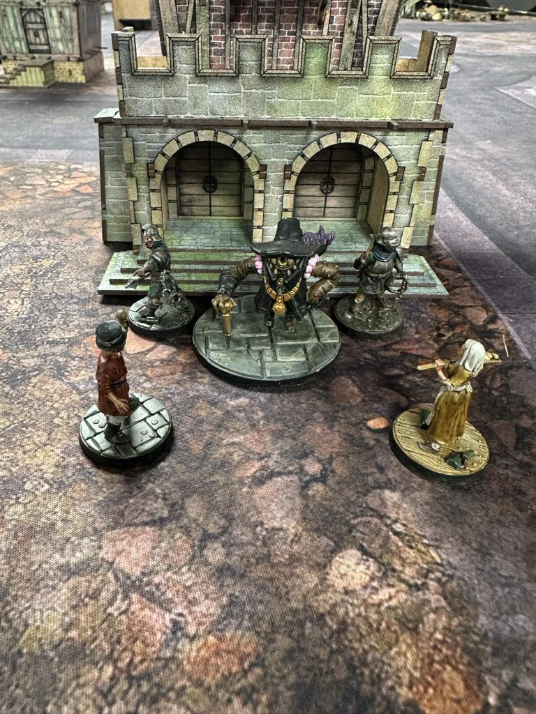 A Beholder-Mayor and Two Guards face off against citizens.